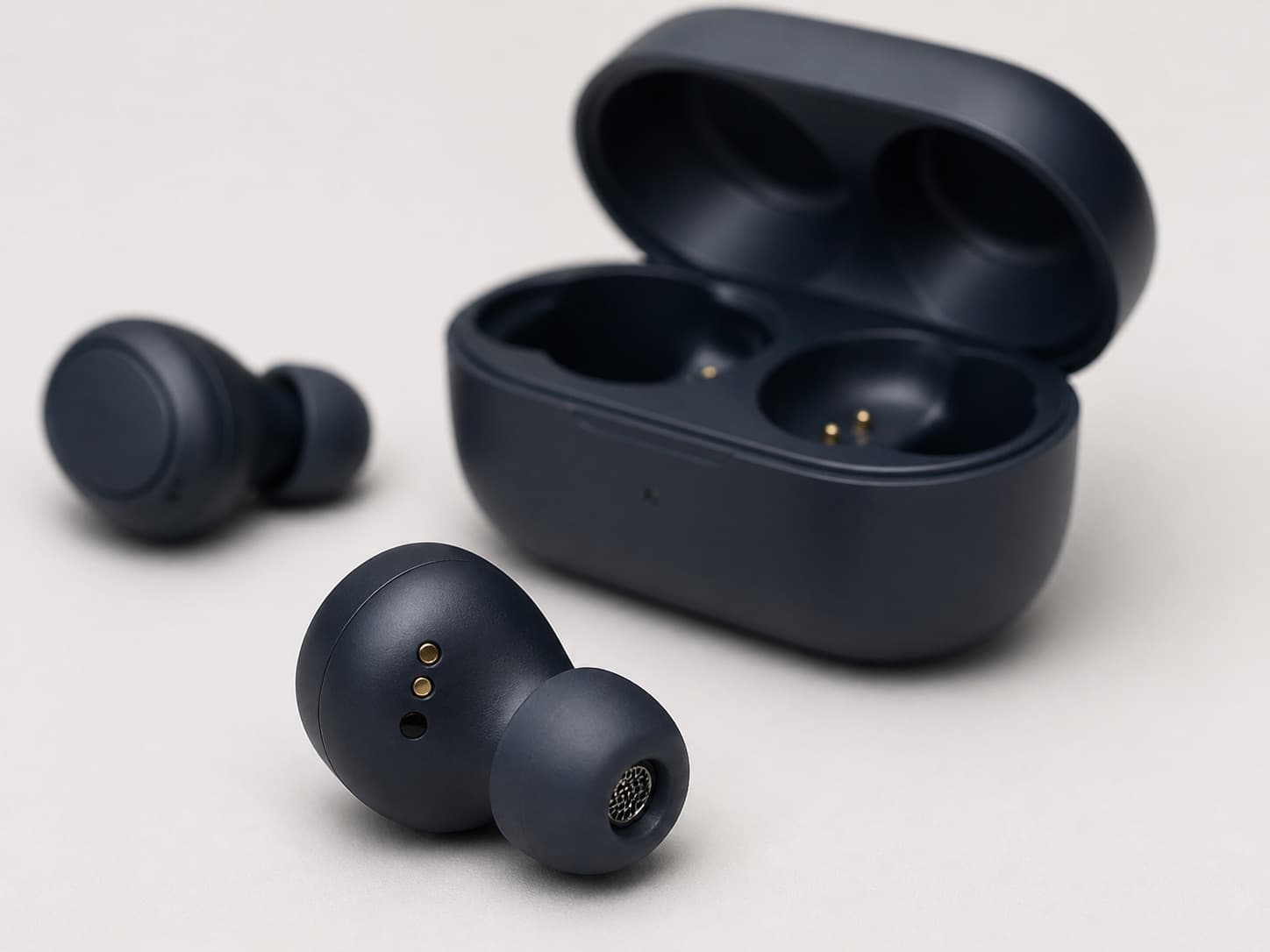 Detail view of Bluetooth earbuds and charging case